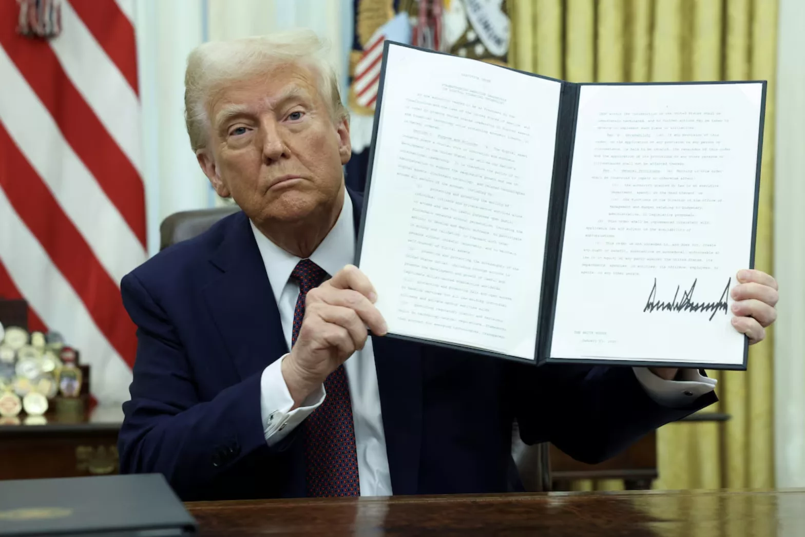 Trump holding the crypto executive order, Jan 2025